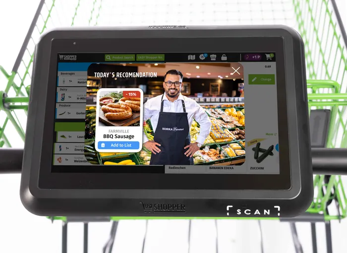 Interactive digital screen on a smart shopping cart displaying product recommendations and special offers to the shopper